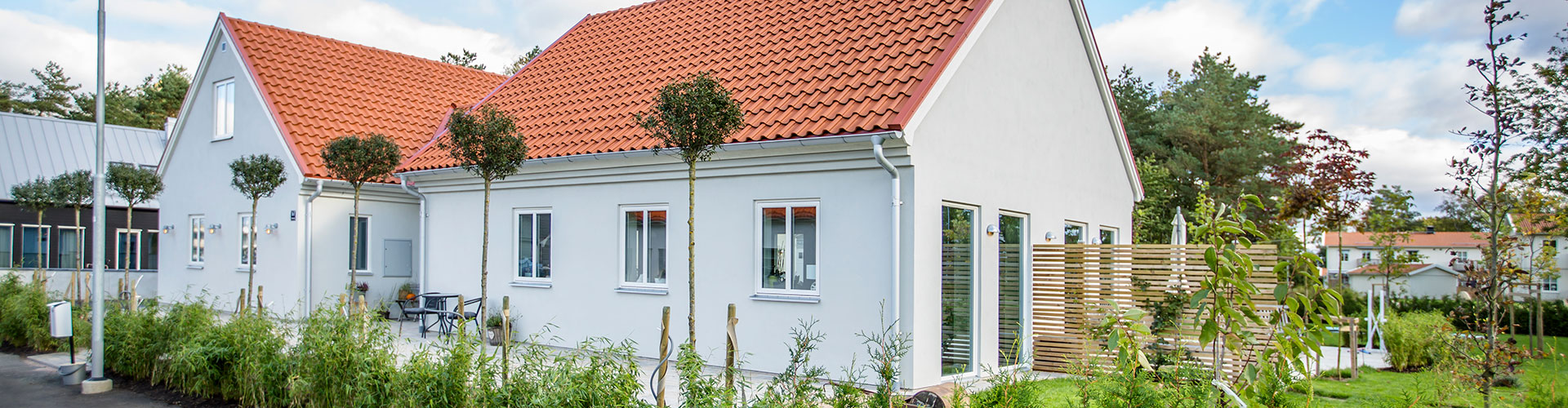 Hus med putsad fasad
